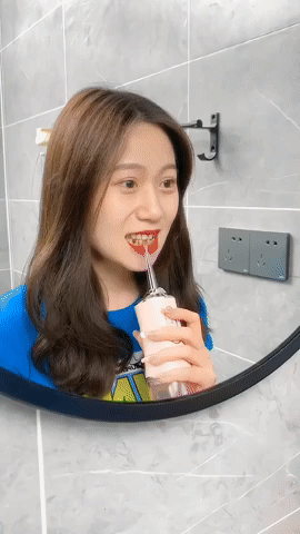 HydroSmile - LIMPIADOR IRRIGADOR DENTAL ELECTRICO - COLOR ALEATOREO